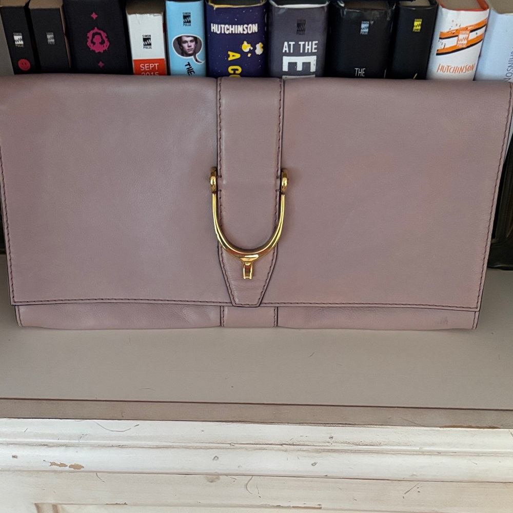 Gucci Mauve Clutch with brass stirrup closure